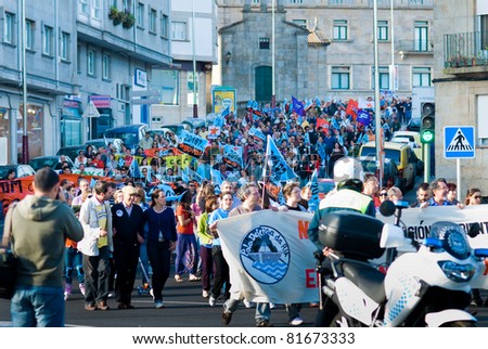 PONTEVEDRA, SPAIN - JUNE 11: Demonstration for the closure of the pulp mill in the Estuary of Pontevedra in Galicia, June 11, 2011 in Pontevedra, Spain.