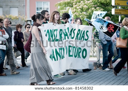 PONTEVEDRA, SPAIN - JUNE 11: Demonstration of ecologists for the closure of the pulp mill in the Ria of Pontevedra in Galicia, June 11, 2011 in Pontevedra, Spain.