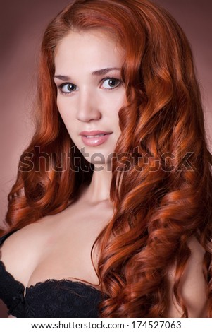 Red Hair woman with perfect skin. Spa, skincare, cosmetology, beauty model, clean skin. beauty woman with red curly hair. Ginger girl. studio. isolated.