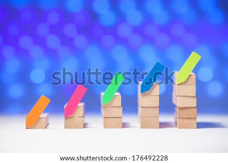Wood graph with blue background and colorful sticker