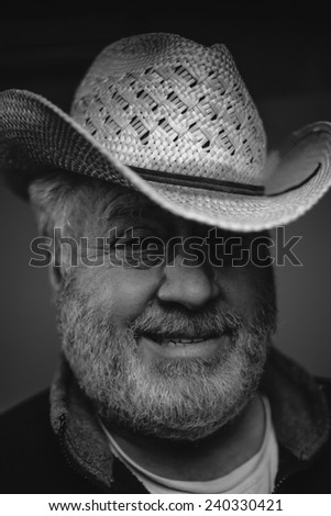 Older Man with Cowboy Hat Black and White
