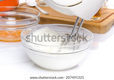 Preparation of a French ring cake, named savarin, isolated on white