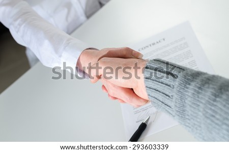 Handshake after contract signing