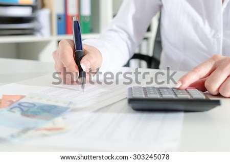 Woman accountant working on financial results
