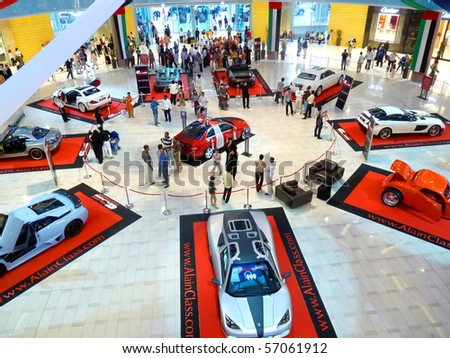 DUBAI, UAE - FEBRUARY 19: Luxury sports cars on display during Auto Exhibition at Dubai Mall February 19, 2010 in Dubai, United Arab Emirates.