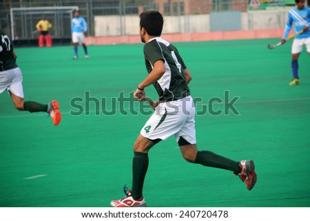 SIALKOT, PAKISTAN - DECEMBER 2014: All Pakistan Annual Field Hockey Tournament Between PIA and PAF Teams at Sialkot International Hockey Stadium on December 30, 2014