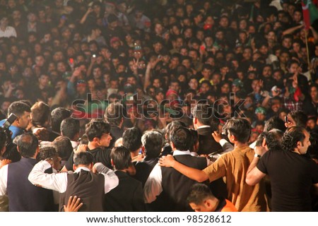 SIALKOT, PAKISTAN - MAR 23: Imran Khan delivering a speech at Jinnah Cricket Stadium during a political rally on March 23, 2012 in Sialkot, Pakistan