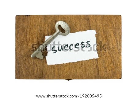 success concept with key on box