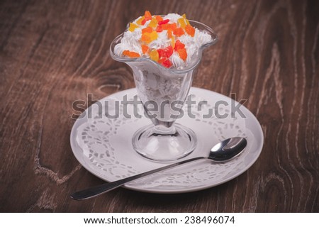 whipped cream dessert with fruit in glass
