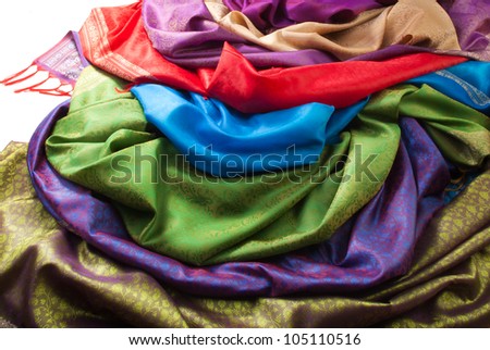 Pile of beautiful fabrics of different color and texture