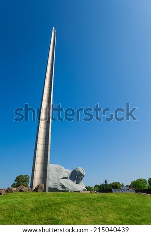 Soldier head and memorial obelisk in Brest, Belarus, world war 2 first attacked in USSR