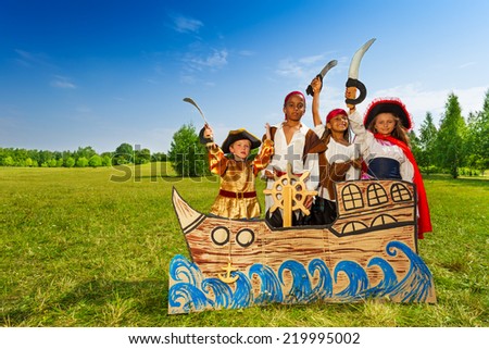 Happy diversity children as pirates with swords