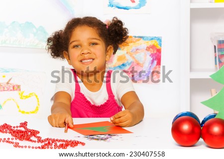 Close up view of girl with Christmas carton card