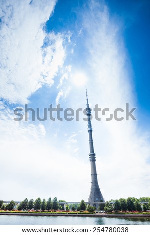 Ostankino tower with pond in front during day in summer in Moscow, Russia