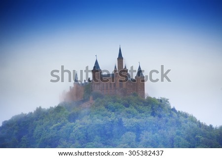 Amazing view of Hohenzollern castle in haze during summer time in Germany
