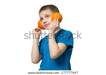 Teenager listening to music via headphones fruit