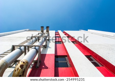Metallic tube for air ventilation on industrial building.