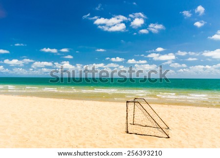Goal soccer on the beach blue sky background.\
Goal soccer on the beach.