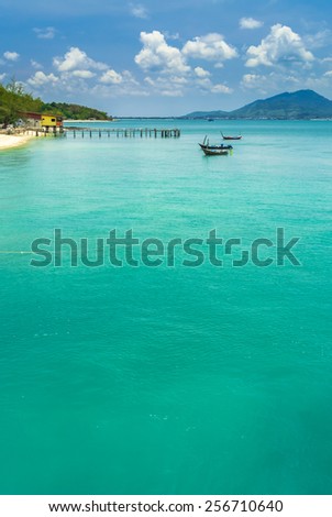 Fishing boat floating in the sea on blue sky background. \
Fishing boat floating.