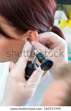 Patient having an ear exam