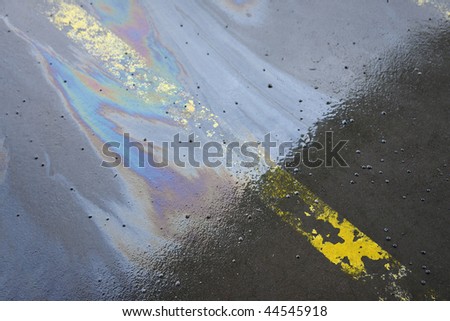 Oil stain on wet road