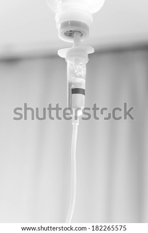 Close up infusion bottle with IV solution at the hospital