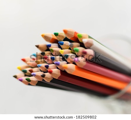 A colored pencil is an art medium constructed of a narrow