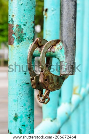 old handcuffs with old gates