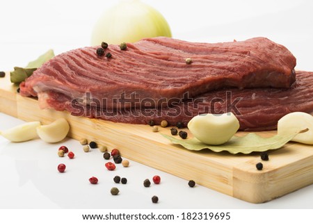 Raw meat, beef, cake mix on white background