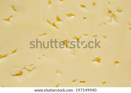 Cheese with holes, yellow can be used as a background