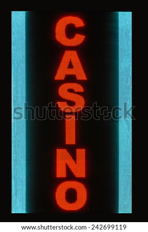 Casino neon sign glows at night