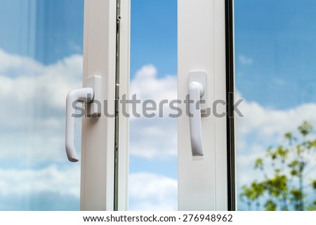 The plastic window is and a pen on a beautiful blurred background