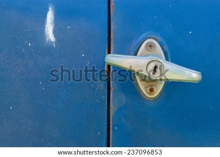 old blue car door is lock