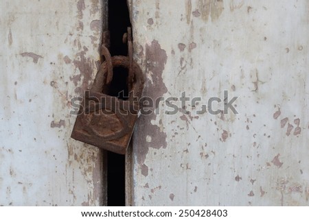door is lock with rusty key