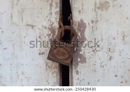 door is lock with rusty key