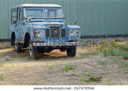 old 4 wheel drive car parking in the zoo but now it can not drive