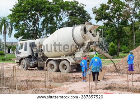 CHONBURI THAILAND MAY 8 :unidentified labor working with cement truck to make main pillar of building on 8 May 2015 at Sattahip Chonburi Thailand