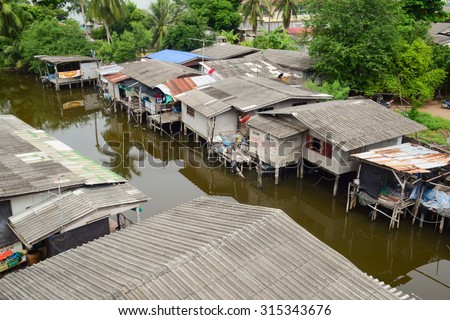 HUAHIN THAILAND 9 SEP:poor people in Thailand build easy house side river at Huahin Thailand on 9 sep 2015