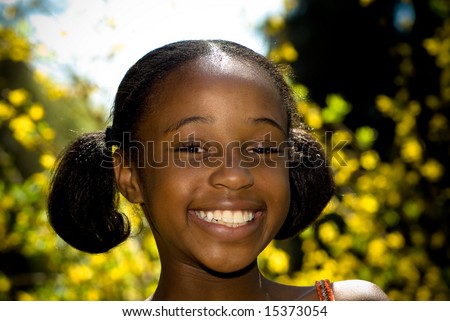 big smile from a young african american girl