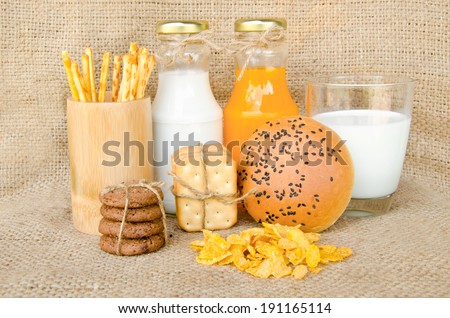 Whole wheat bread and biscuits in breakfast set on sack background