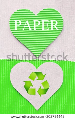 heart green corrugated paper and sign recycle. recycle paper concept.
