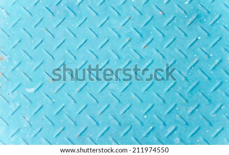 Background of old blue color metal diamond plate.