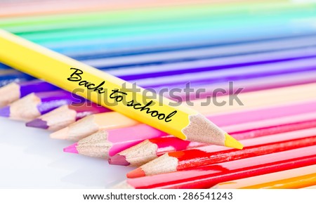 Colorful pencil crayons on a white background, Back to school.