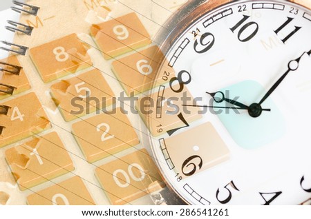 Business concept with calculator, pocket watch and compass