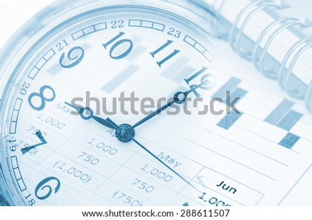 future technology and time management concept - clock, report graph and diary.