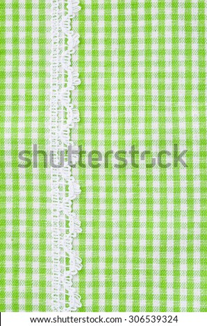 Green and white tablecloth italian style with white lace texture wallpaper or background.