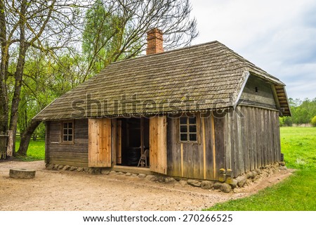 Old shed house in the countryside. Lithuania.