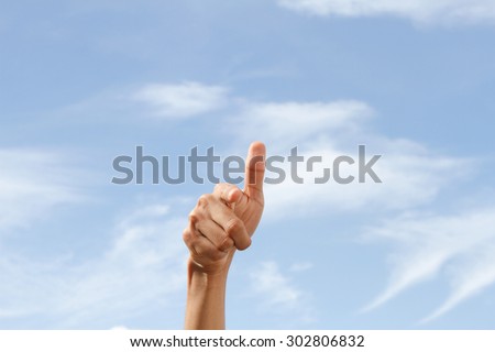 men\'s hand shows the sign that everything is fine, everything is very good. Space for text. Left, right. Concept about the good things and the good news.