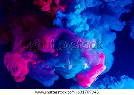 Motion Color drop in water,Ink swirling in water,Colorful ink in water abstraction.Fancy Dream Cloud of ink in water soft focus