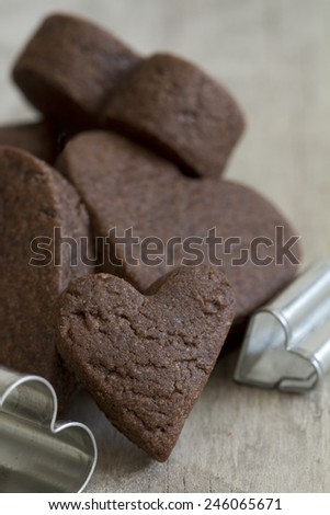 Close Up of Heart Cookie Cutters and Cookies